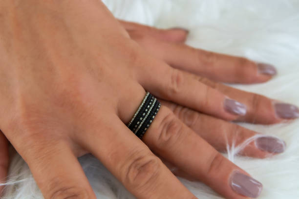 Protecting fake jewelry with a layer of clear nail polish