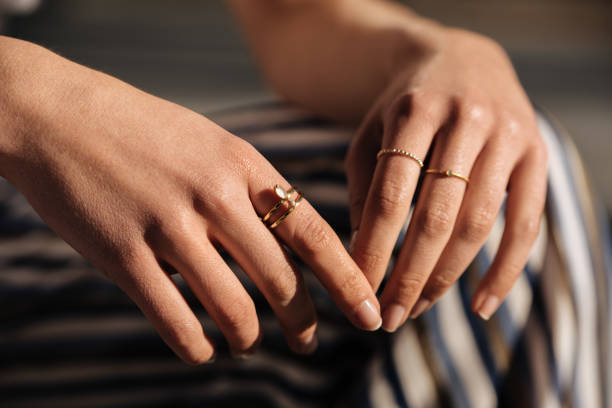 Fashionable combination of signet ring and wedding ring on hand